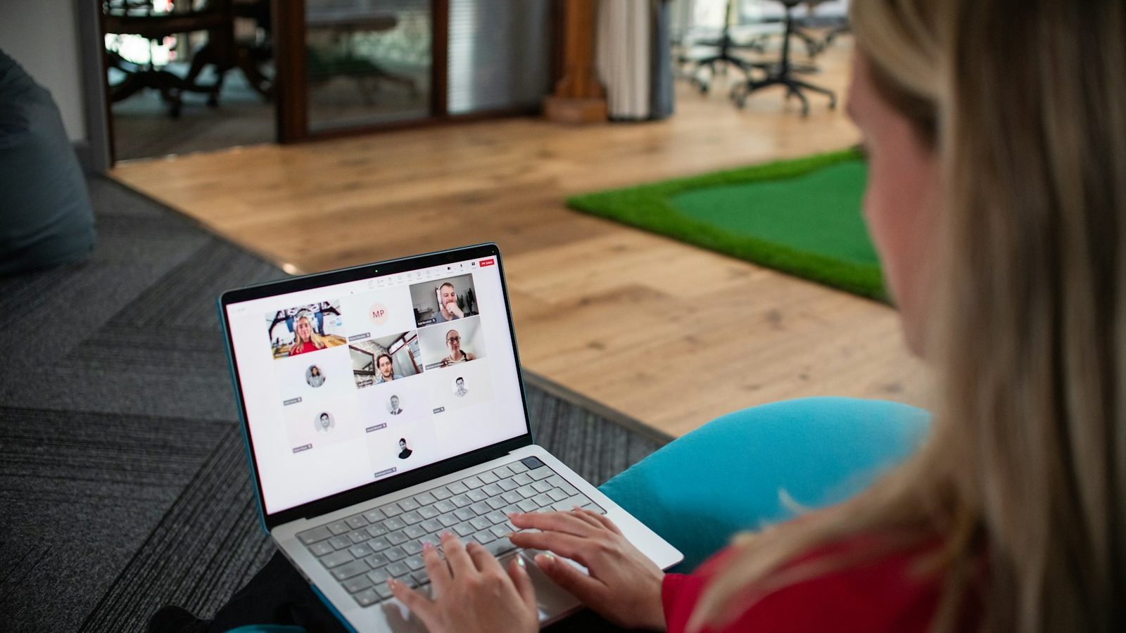 Recruiter on a video chat with candidates at a virtual job fair